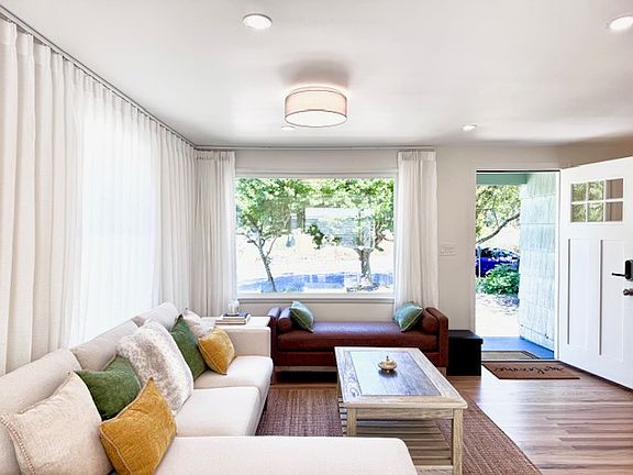 Bright spacious living room with brand new furniture.