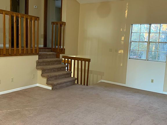 Large family room with ceiling fan & indirect lighting - lots of windows for natural light View of Little Bayou Castine Flyway from side windows - you can hear the owls at night calling out