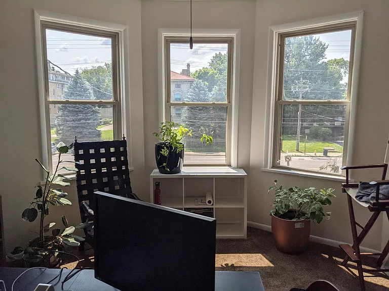 Bedroom #2 on second floor with bay window. Currently being used as an office.