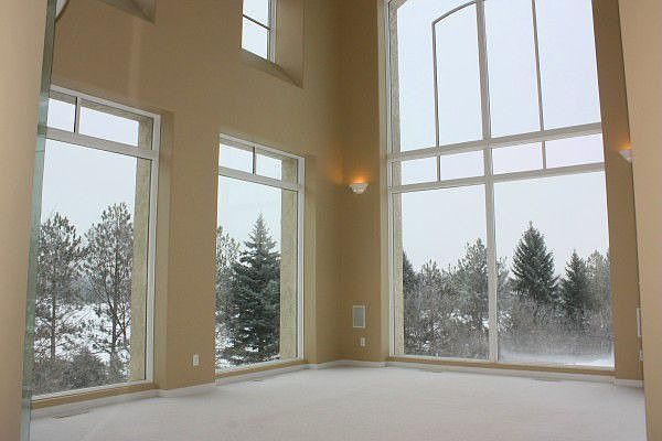 Natural light and view of nature stream through the walls of glass.