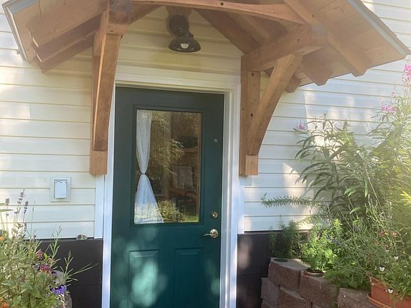 Timber-peg covered entrance