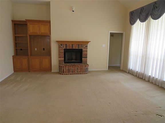 Living area with hearth centerpiece