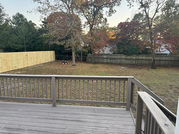 Private backyard with deck