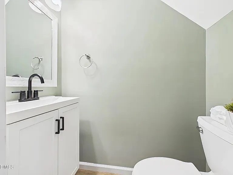 Downstairs half bathroom.