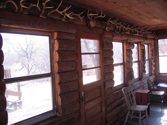 Looking SW in sun porch.