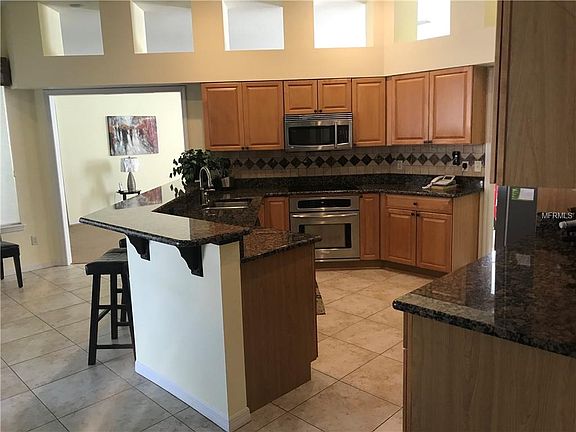 5th image of 8437 Island Palm Cir