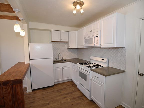 Remodeled kitchen with gas stove