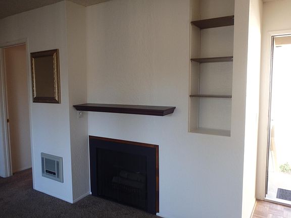 Gas log fireplace in living room