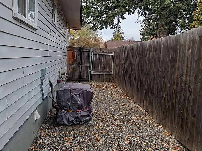 New central air unit on north end of house