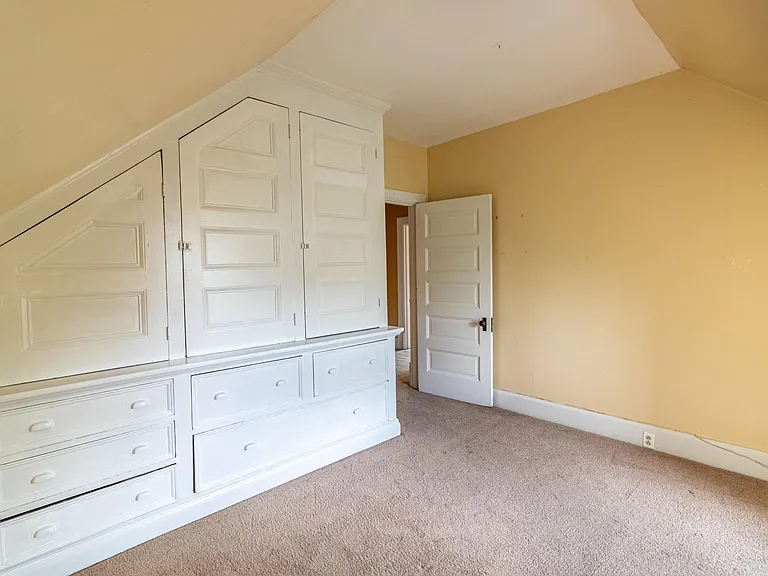 Bedroom 2 original built in shelving / drawers