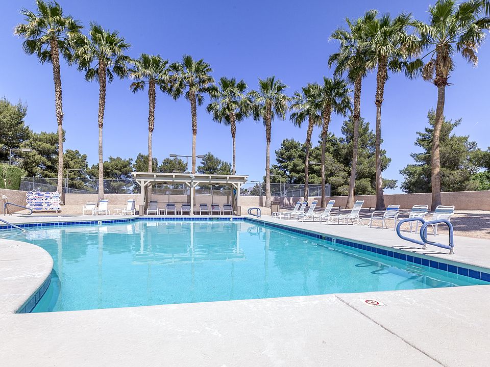 Large pool with patio seating