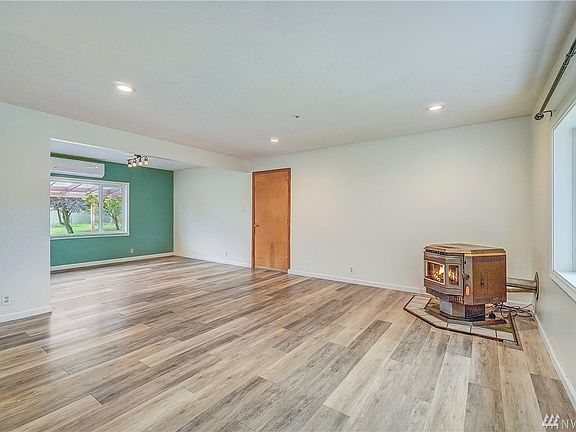 The blended living and dining area has easy care flooring that carries through to the kitchen.