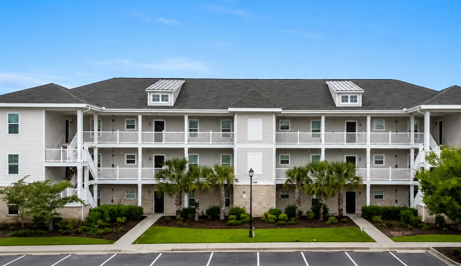 Third Floor Comfort Meets Picture Perfect Pond Views — Photo 1