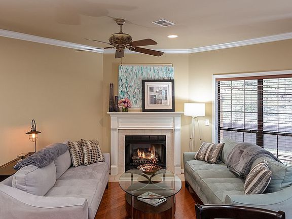 Mantled automatic fireplace