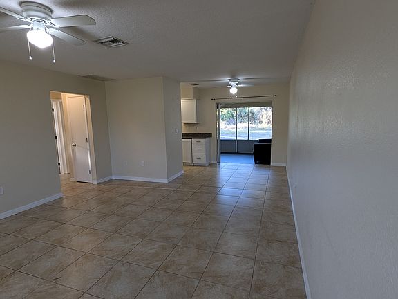 Living Room looking towards dining room and porch