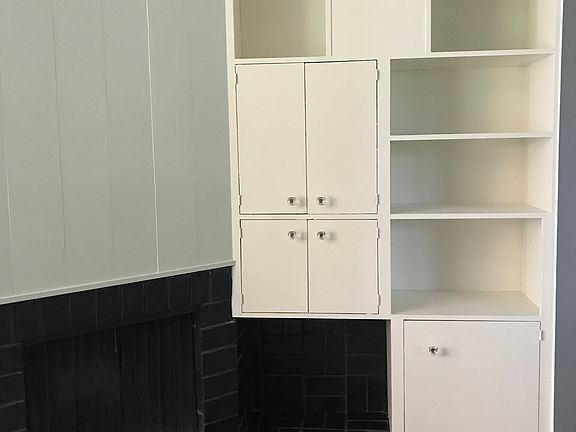 Wood burning fireplace and built-ins