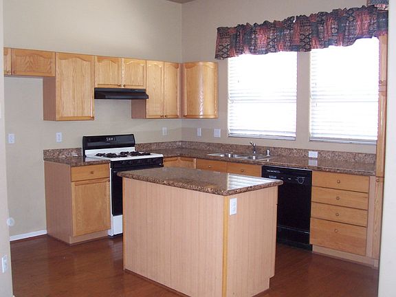 Kitchen with granite counters and island