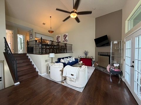 Living room with french doors leading to porch.