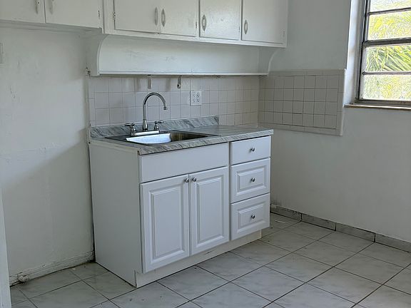 5th image of 1150 71st St APT 8