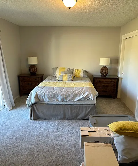 2nd bedroom with on suite bathroom and patio door to backyard
