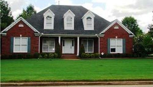 851 Hickory Oaks features low  maintenance exterior and new roof 