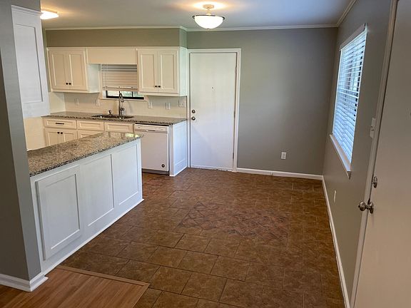 Dining area between Living Room and Kitchen