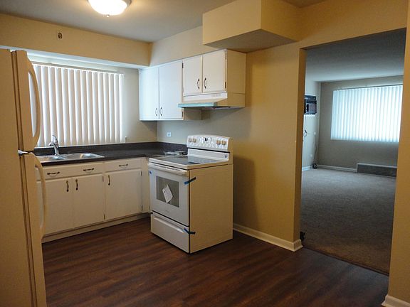 Kitchen facing living room.