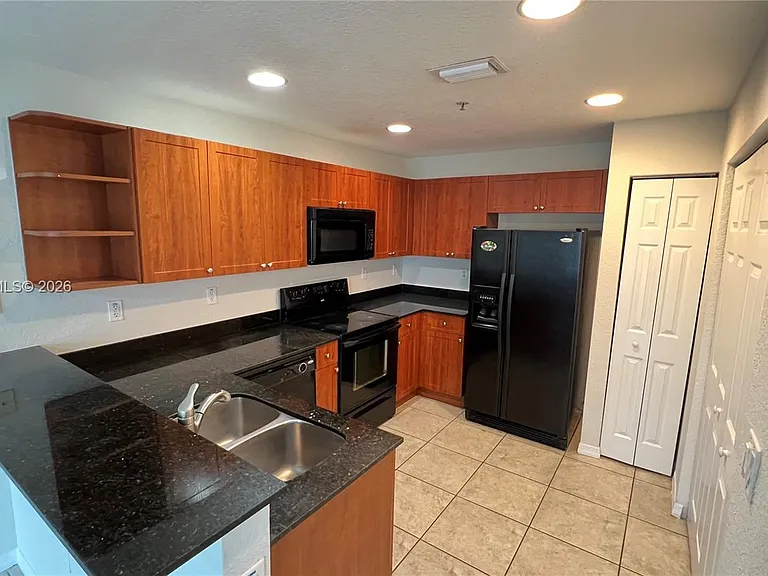 10885 NW 89th Ter #221 — Photo 6