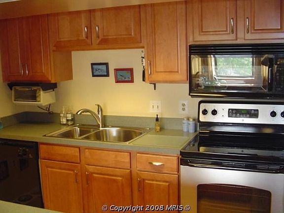 Kitchen with new appliances and cabinets