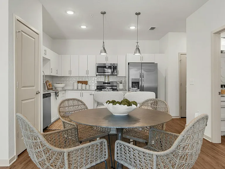 Experience sophistication in this contemporary kitchen and dining space.