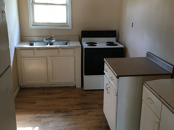 Kitchen w/ Stove and Fridge