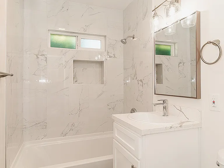 Bathroom with Tile Shower surround.