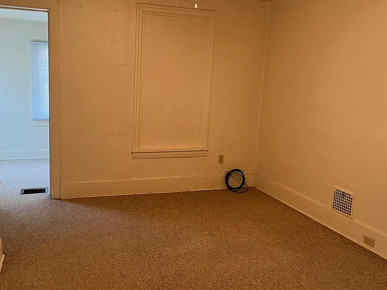 Main bedroom with additional office or study area