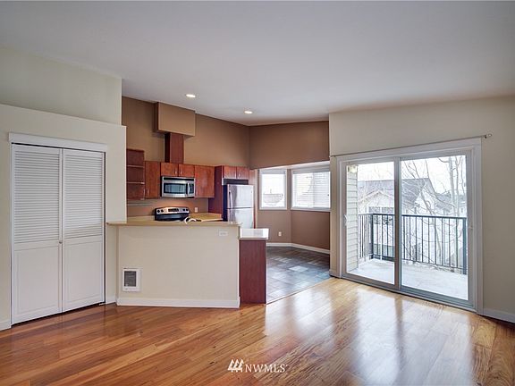 Engineered hardwoods, a nice dining space and quiet balcony