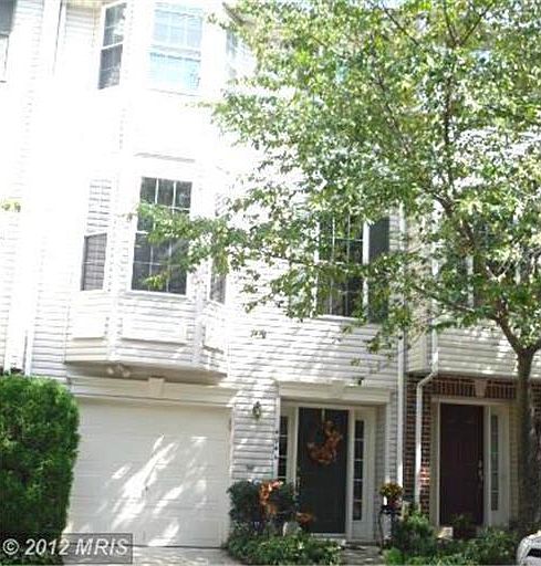 Front exterior with bay windows