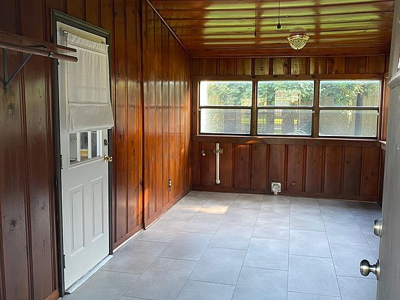 Bonus Room connecting Garage and Kitchen. Washer and gas dryer connections.