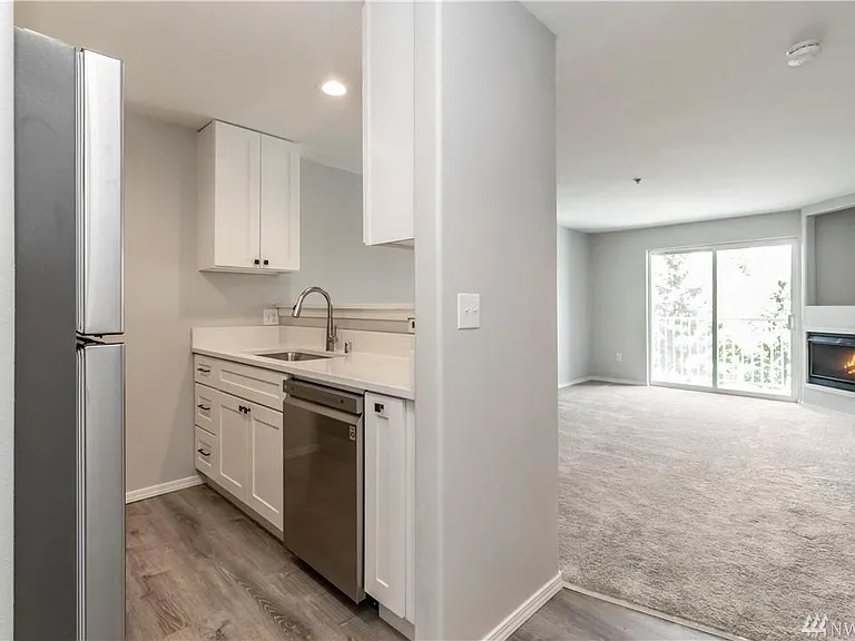 Entry open to kitchen and living room