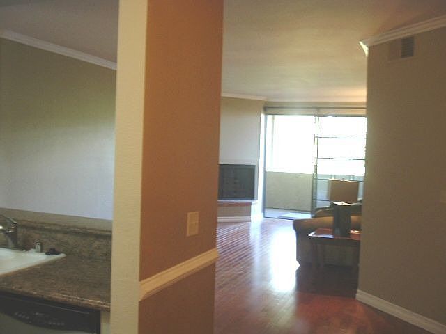 From Dining/Kitchen to Living Rm w/Fireplace