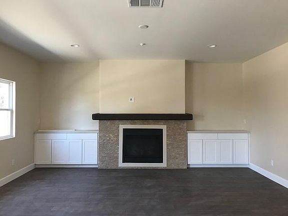 Stacked stone F/P with custom built ins