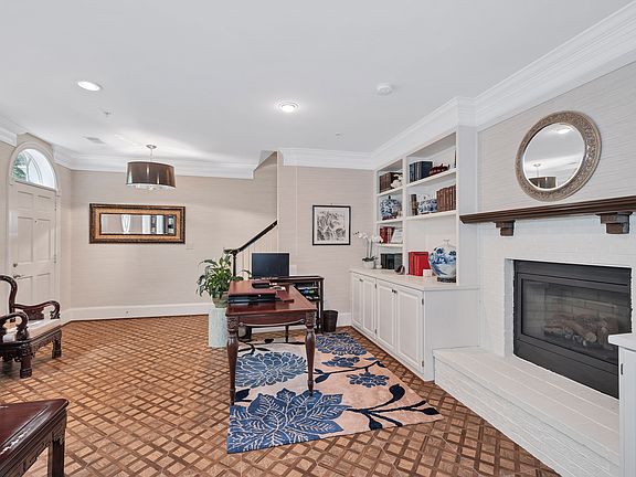 Recreation Rm w/ Gas Fireplace & Custom Built-ins