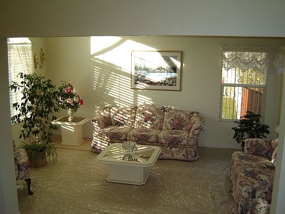 Formal Living Room with Afternoon Sun (plastic protector on new carpet)