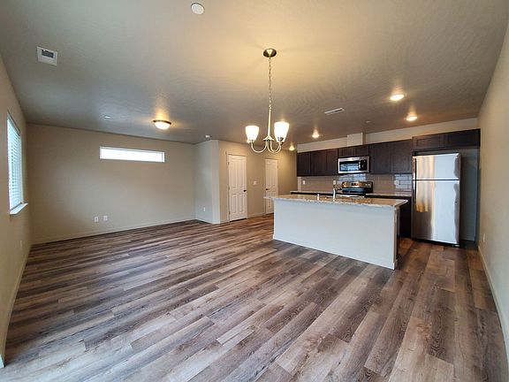 2nd image of 5701 W Albany Pl #110