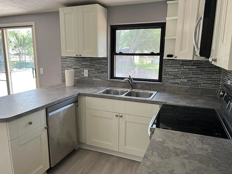 New appliances throughout,microwave,refrigerator with ice maker, water in the door and stove top and oven with air fry feature,built in dishwasher..