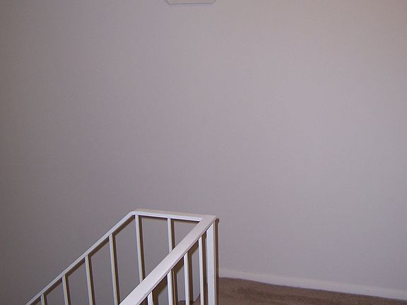 Top of stairs showing window