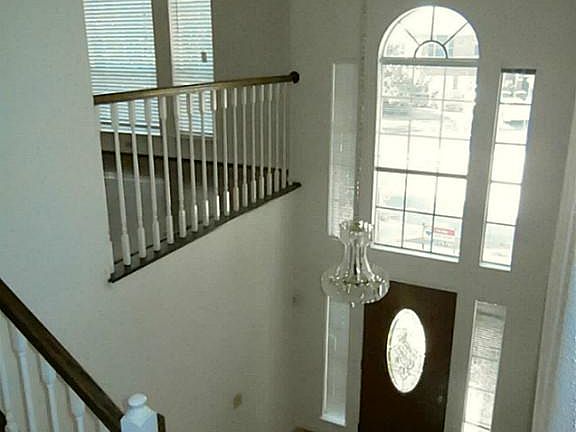 LOOKING ACROSS FOYER TOWARDS OPEN GAMEROOM