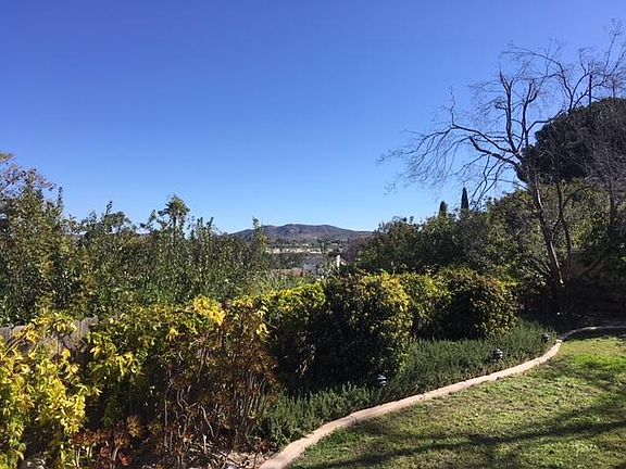 Enjoy the mountain views from your private yard 