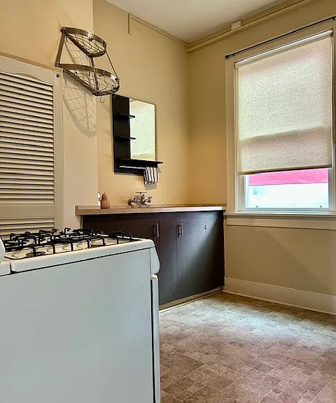 Separate kitchen area with another window letting in more light