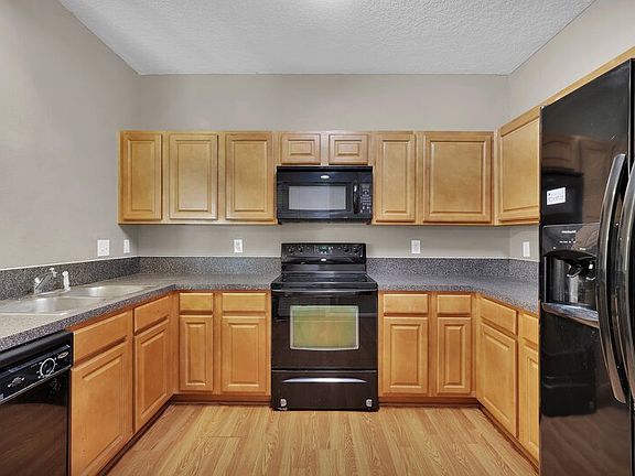 5th image of 6965 Ortega Woods Dr Unit 2