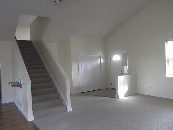 Living room, stairway to 2nd level