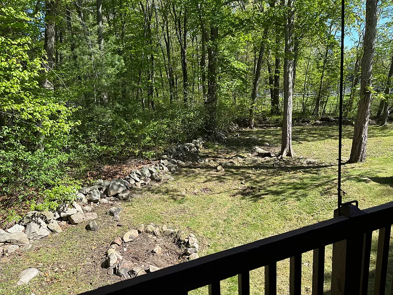 View of Backyard and Fire Pit from Elevated Deck